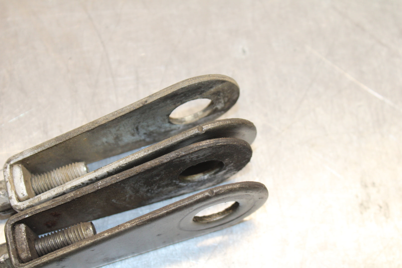 78 SUZUKI GS550E SWINGARM CHAIN TENSIONER ADJUSTMENT BRACKETS  BB133