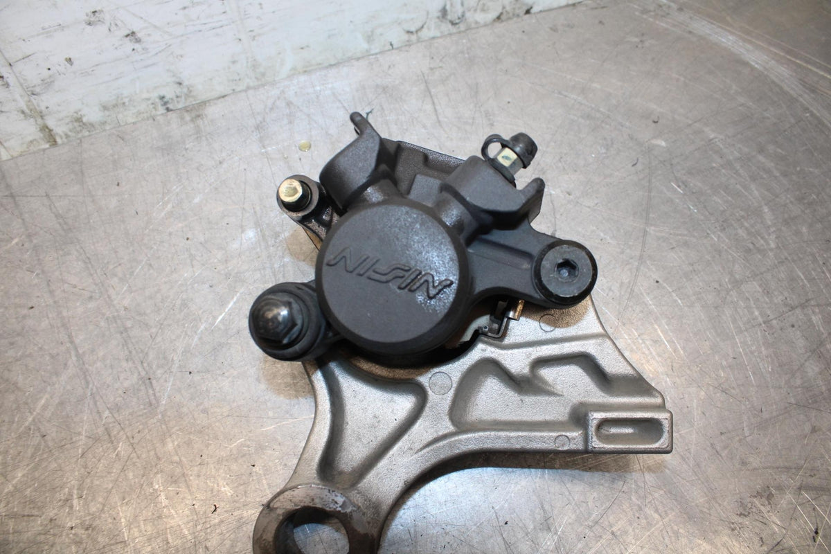 05-06 HONDA CBR600RR REAR BACK BRAKE CALIPER W MOUNT BRACKET BB484