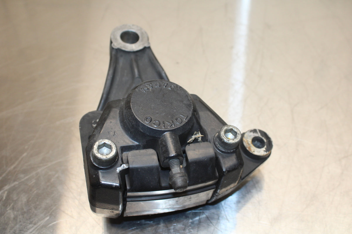 86 SUZUKI GS750ES REAR BACK BRAKE CALIPER W MOUNT BRACKET BB140