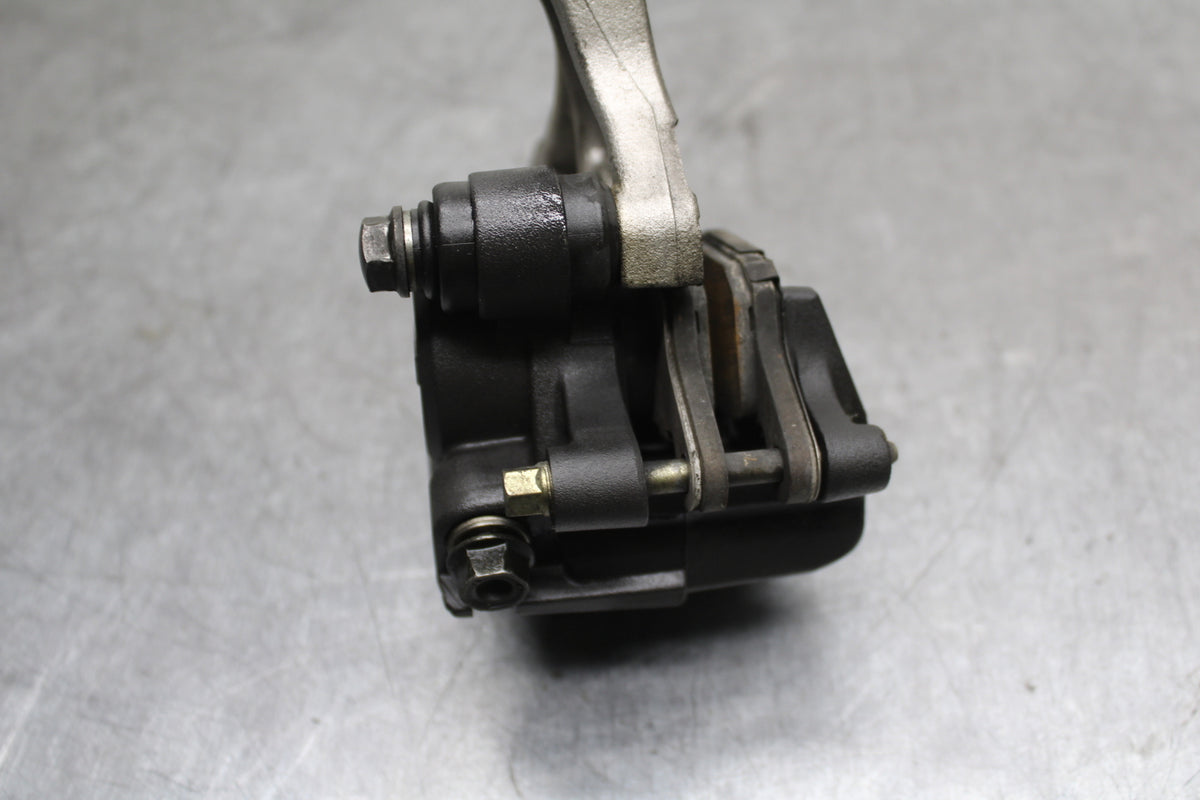 05-06 HONDA CBR600RR REAR BACK BRAKE CALIPER W MOUNT BRACKET BB727