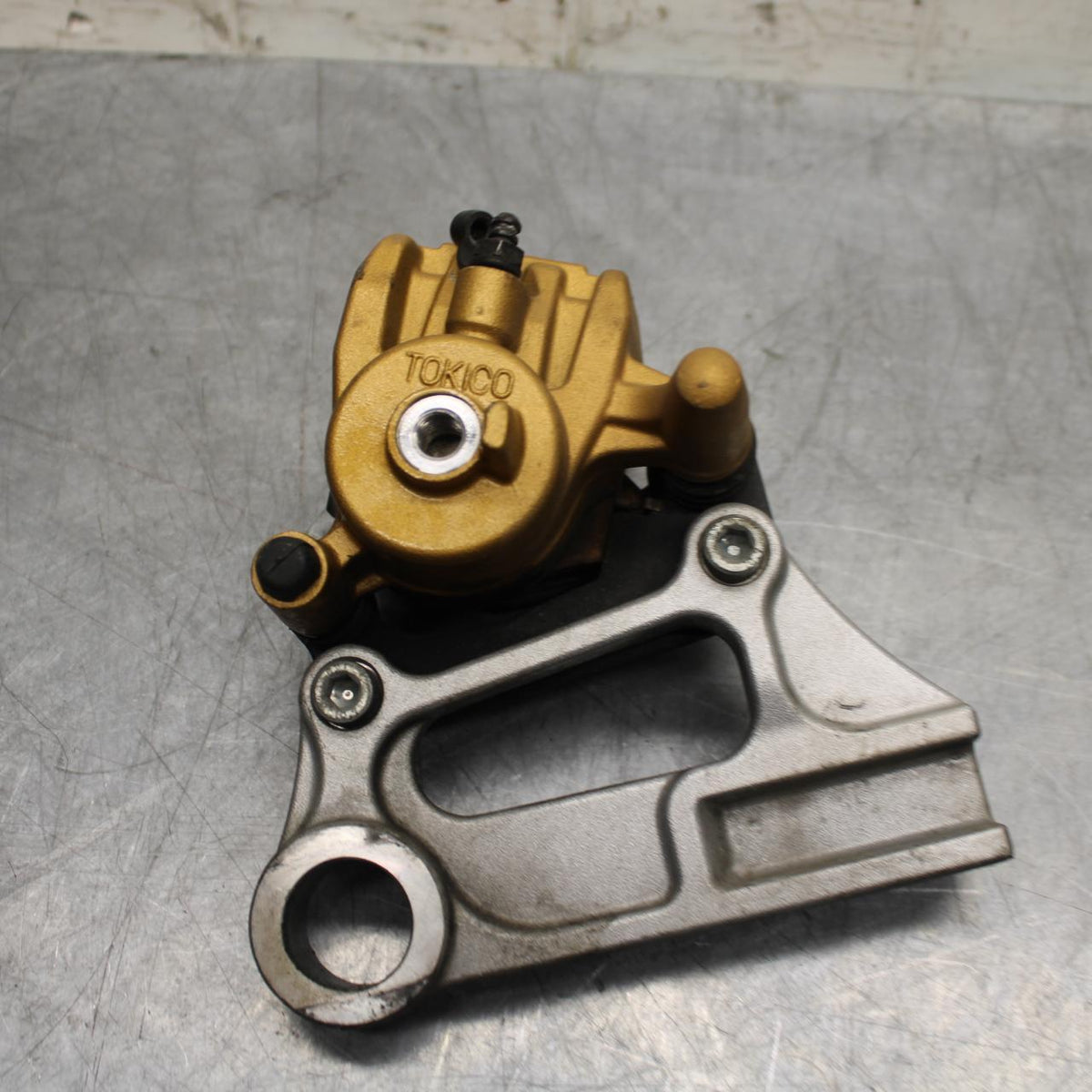 03-06 KAWASAKI Z1000 REAR BACK BRAKE CALIPER W MOUNT BRACKET BB487