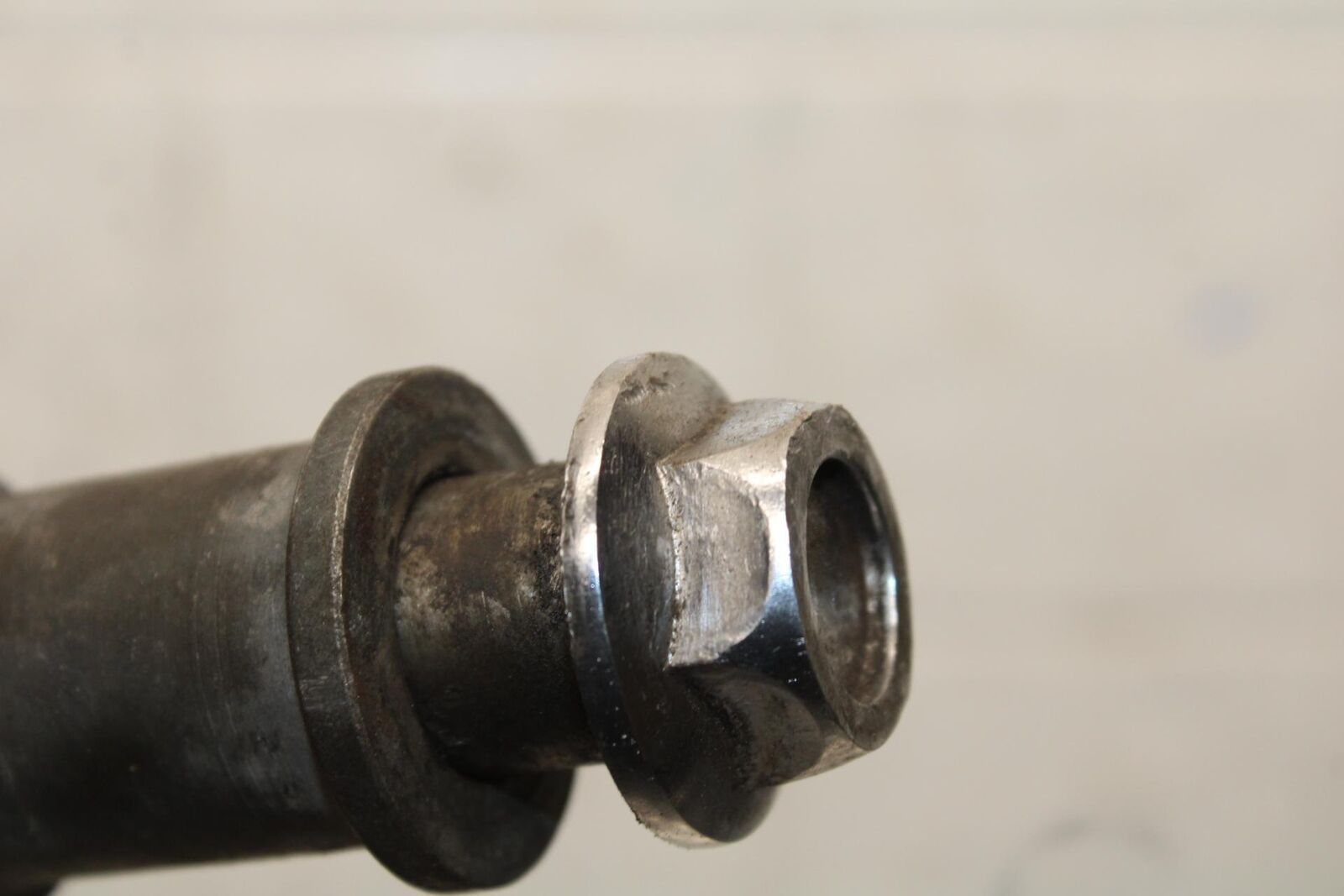 1977 Honda CB550K --- REAR AXLE BACK WHEEL PIVOT BOLT AXEL 42301-300-020 BB592