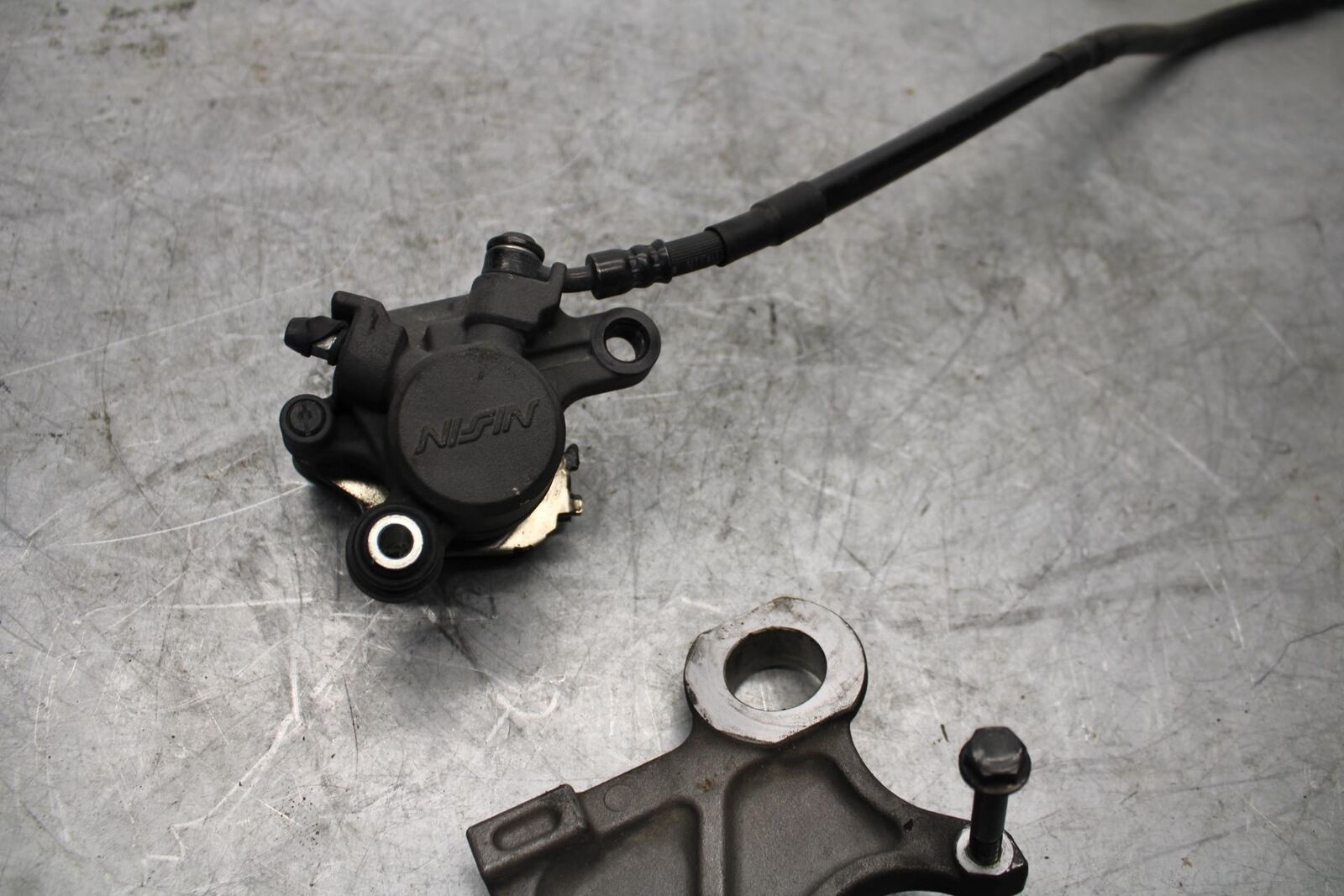 08-16 YAMAHA YZF R6 REAR BACK BRAKE CALIPER W MOUNT BRACKET BB431