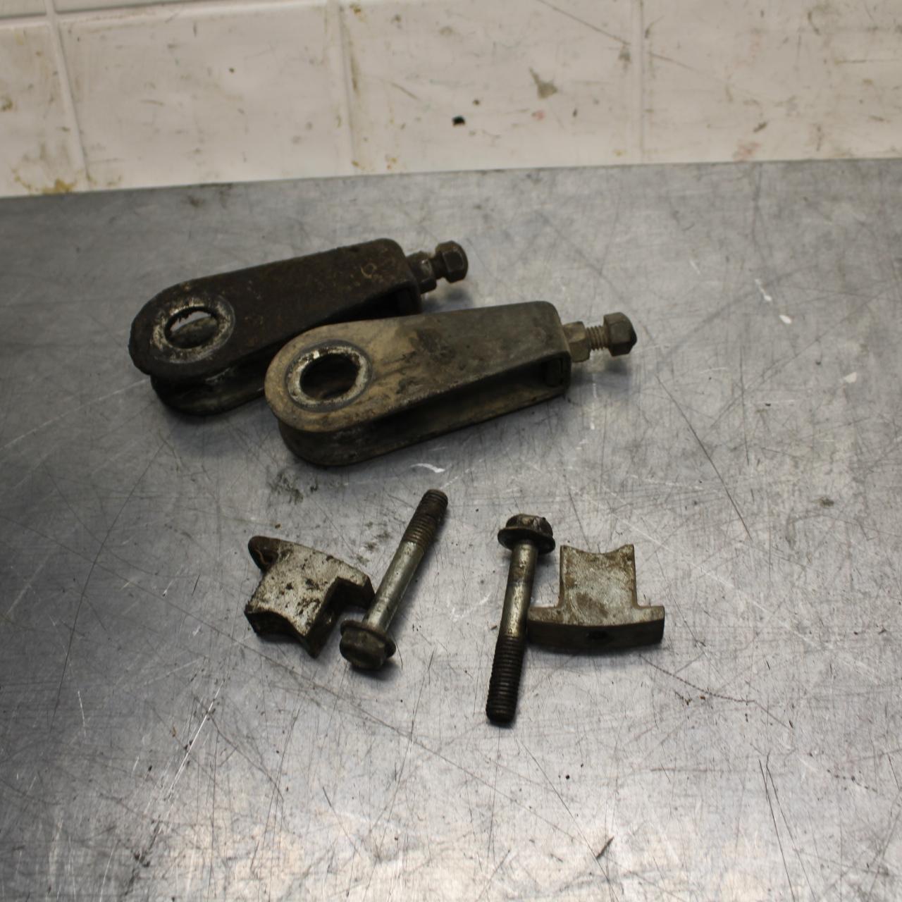 75 SUZUKI GT 550 SWINGARM CHAIN TENSIONER ADJUSTMENT BRACKETS  BB72