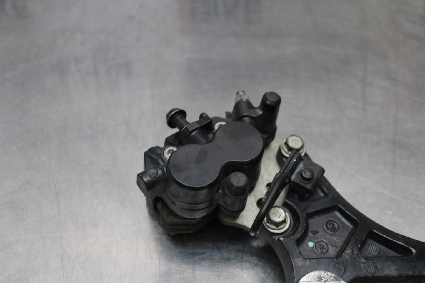 08-18 KAWASAKI KLR650 REAR BACK BRAKE CALIPER W MOUNT BRACKET BB183