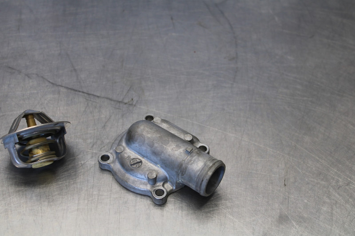 20-22 KAWASAKI NINJA ZX6R THERMOSTAT W HOUSING ASSEMBLY BB884