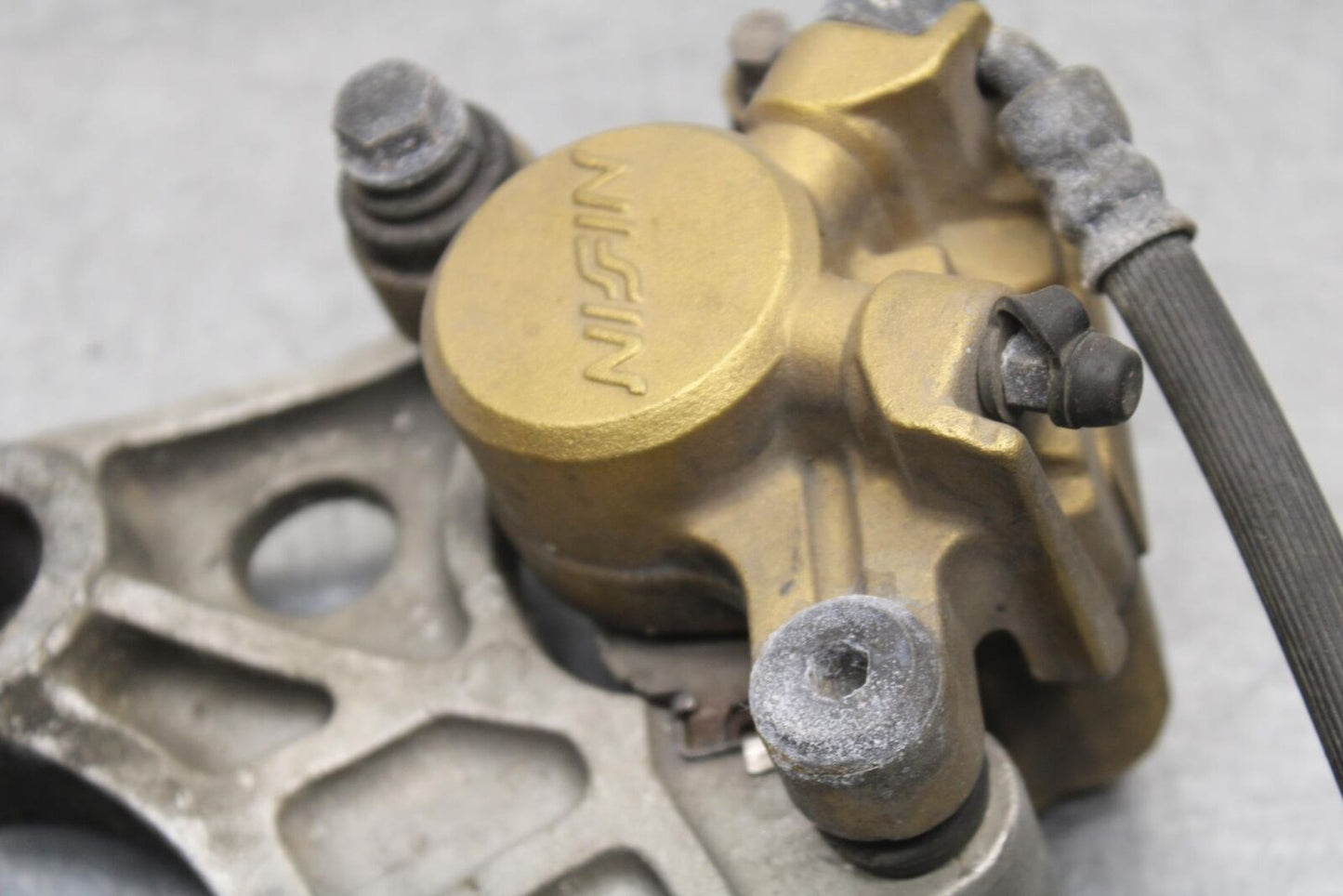 03-04 HONDA CBR600RR REAR BACK BRAKE CALIPER W MOUNT BRACKET 43150-MEE-006 BB637