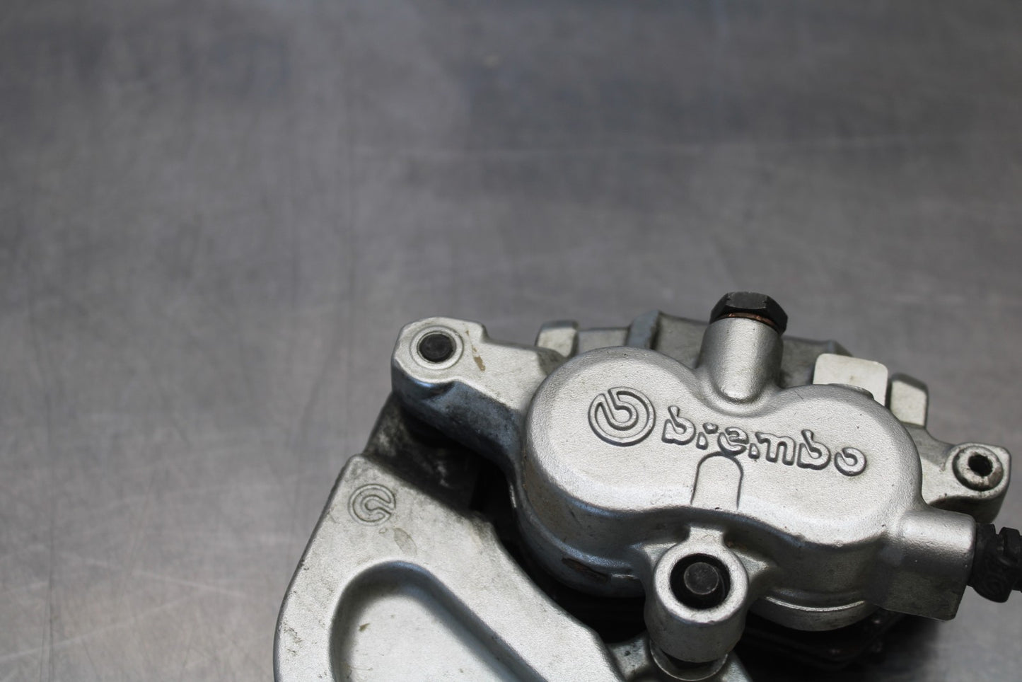 05-06 VICTORY KINGPIN DELUXE REAR BACK BRAKE CALIPER W MOUNT BRACKET BB195