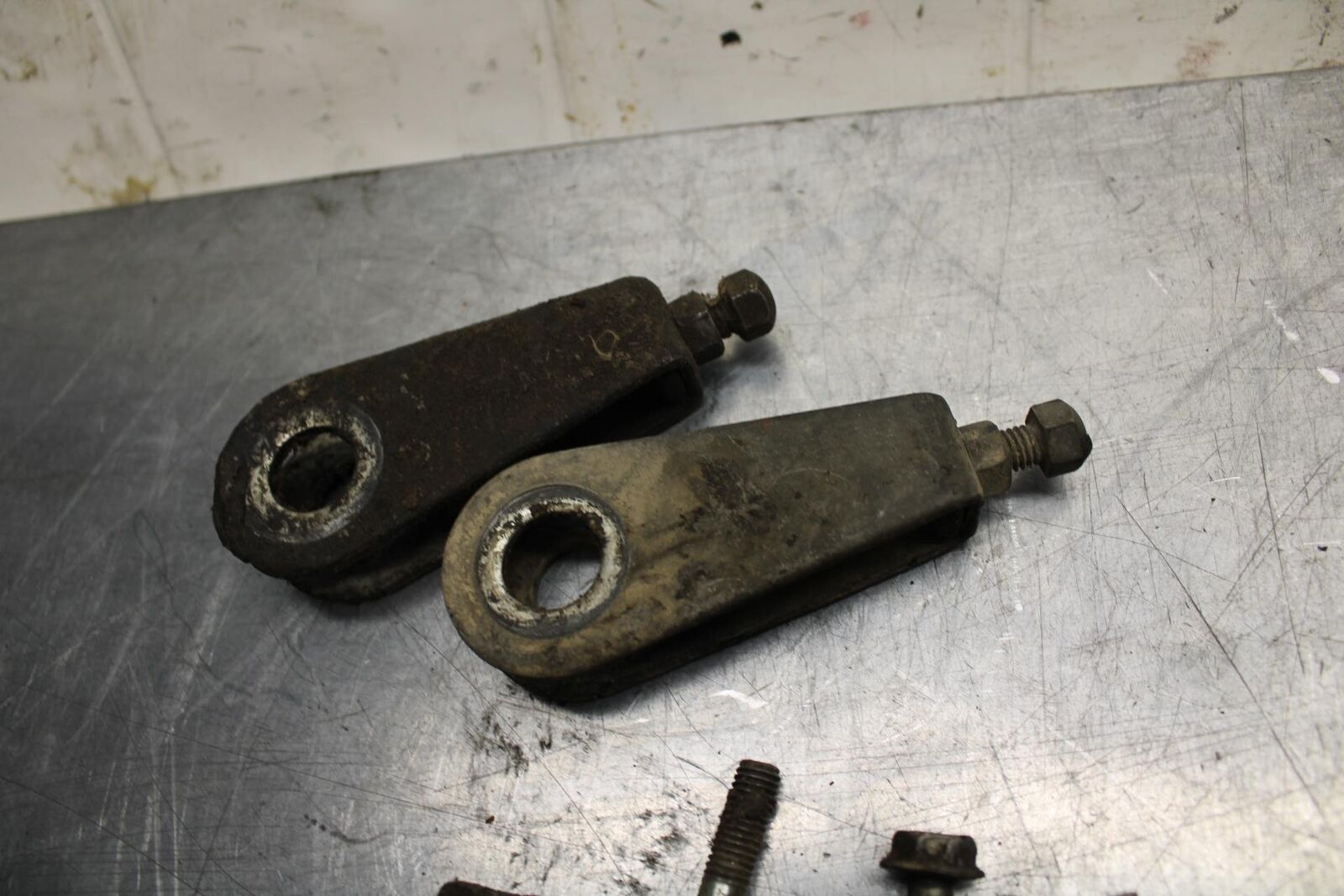 75 SUZUKI GT 550 SWINGARM CHAIN TENSIONER ADJUSTMENT BRACKETS  BB72