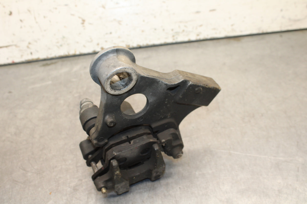01-06 HONDA CBR600F4I REAR BACK BRAKE CALIPER W MOUNT BRACKET BB115