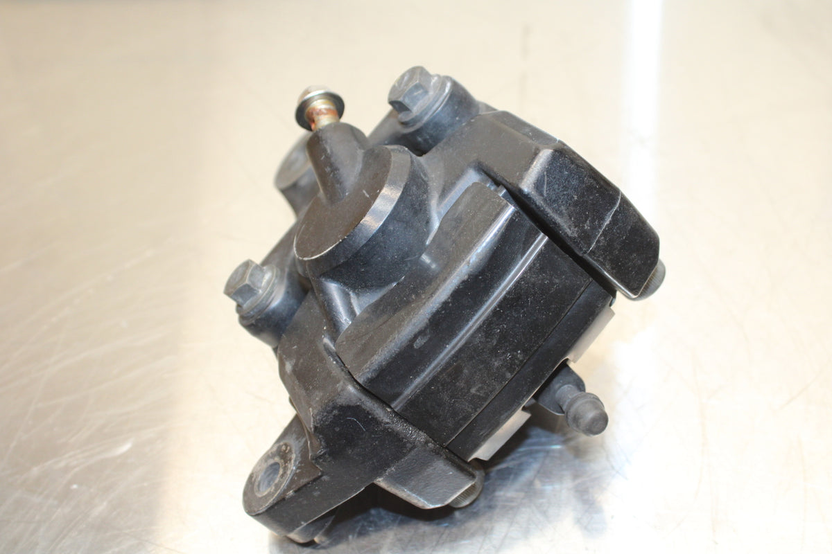 86 SUZUKI GS750ES REAR BACK BRAKE CALIPER W MOUNT BRACKET BB140