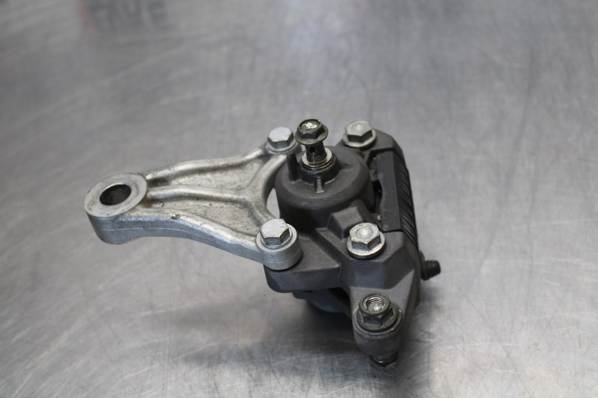 04-09 SUZUKI GS500F REAR BACK BRAKE CALIPER W MOUNT BRACKET BB165