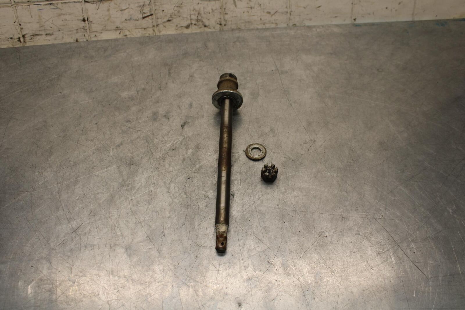 75 SUZUKI GT 550 FRONT WHEEL RIM AXLE PIVOT BOLT BB67