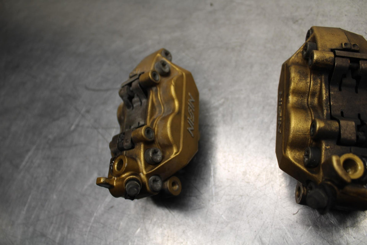 03-04 HONDA CBR600RR RIGHT LEFT FRONT BRAKE CALIPER SET PAIR CALIPERS BB614