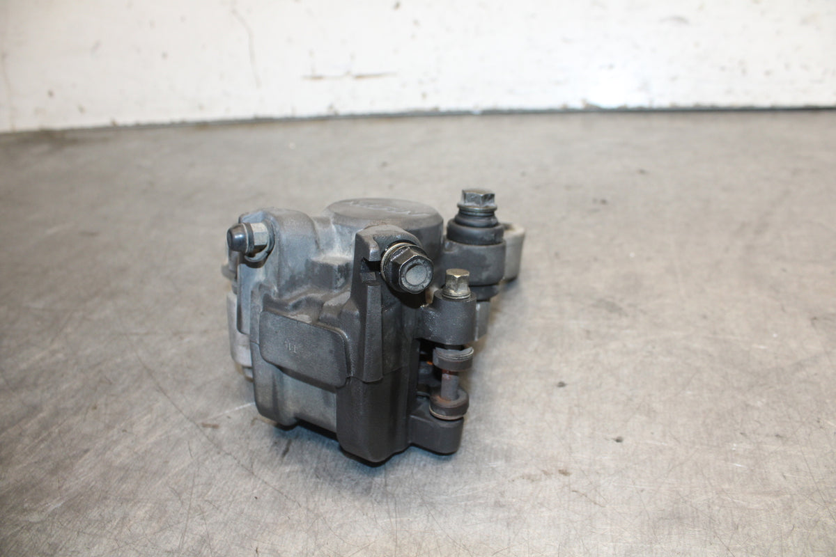05-06 HONDA CBR600RR REAR BACK BRAKE CALIPER W MOUNT BRACKET  BB689