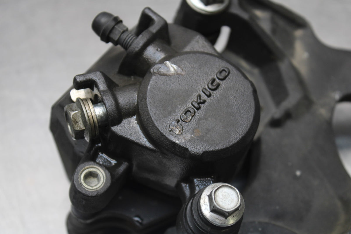 08-10 SUZUKI GSXR 600 REAR BACK BRAKE CALIPER W MOUNT BRACKET BB803