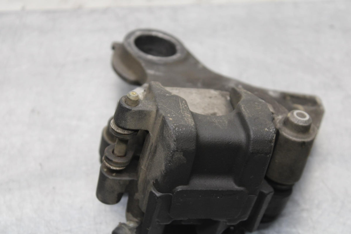 2007 Yamaha YZF R6S REAR BACK BRAKE CALIPER W MOUNT BRACKET BB594