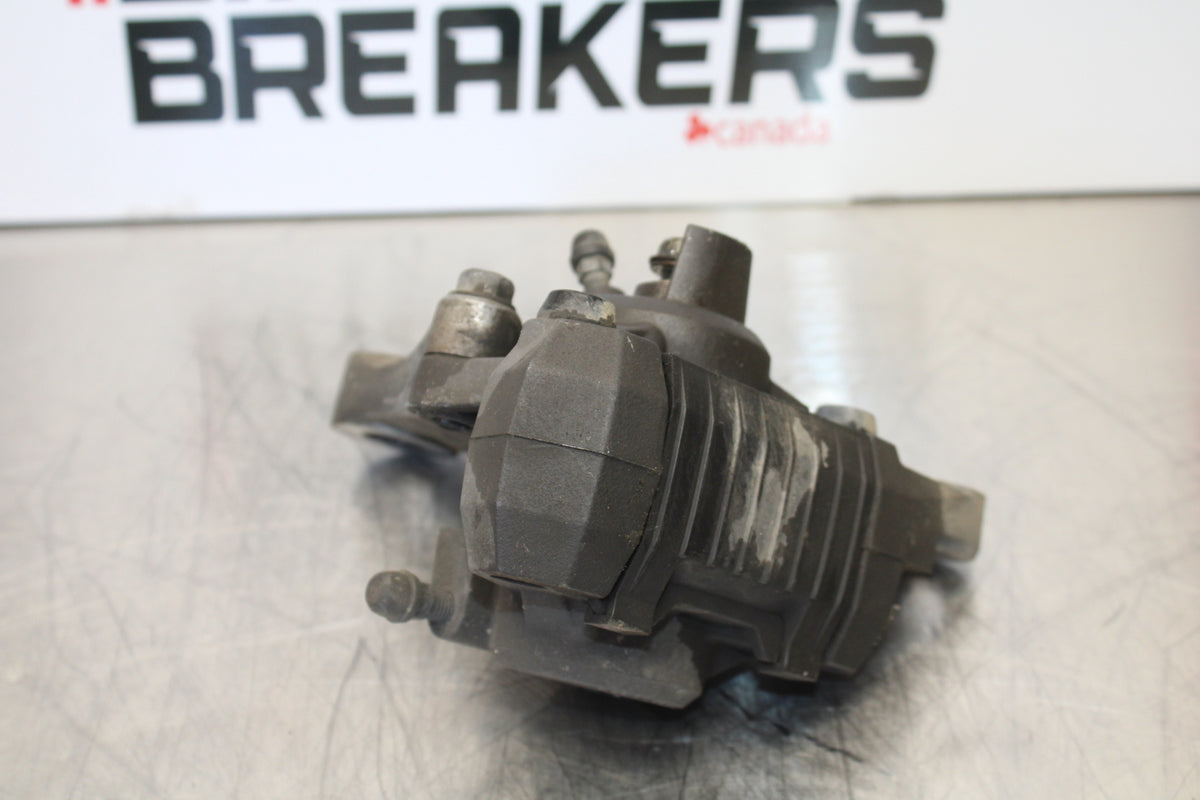 00 SUZUKI SV650 REAR BACK BRAKE CALIPER W MOUNT BRACKET BB156