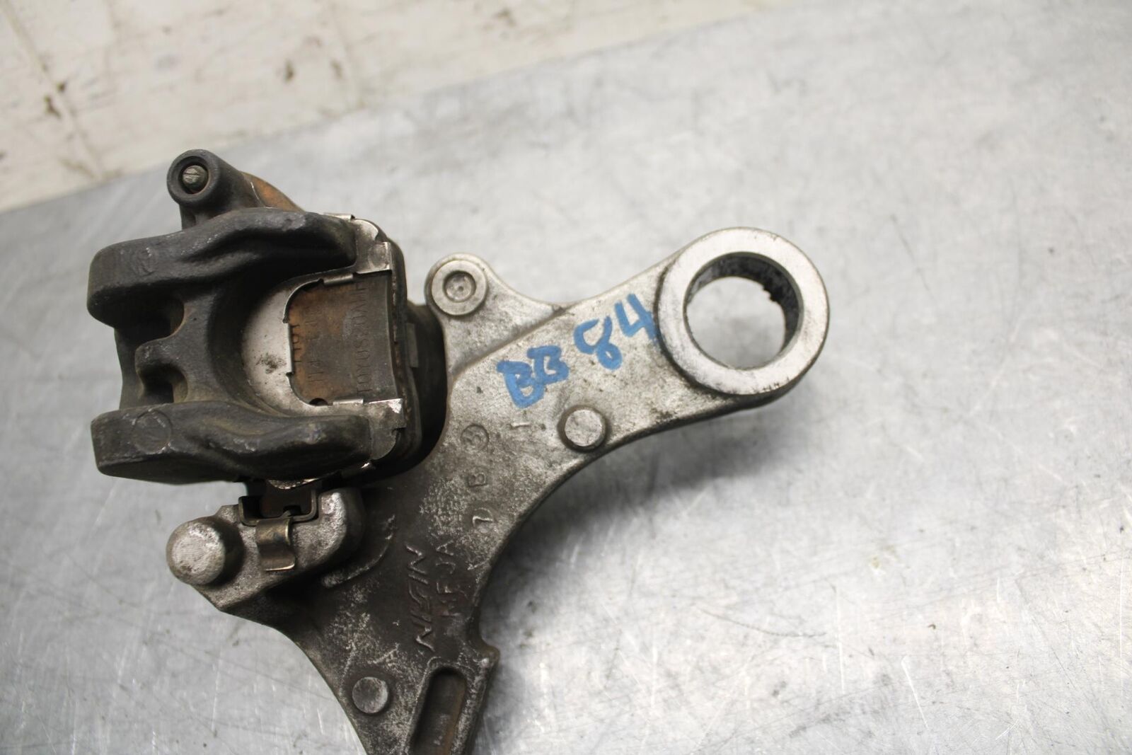 2007 Honda CBR600RR REAR BACK BRAKE CALIPER W MOUNT BRACKET 43150-MFJ-D01 BB42