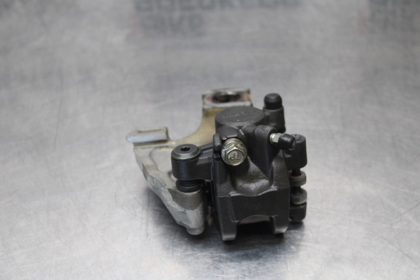 11-22 SUZUKI GSXR 600  REAR BACK BRAKE CALIPER W MOUNT BRACKET BB193