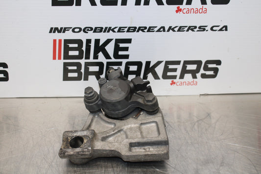 03 SUZUKI SV650S REAR BACK BRAKE CALIPER W MOUNT BRACKET BB167
