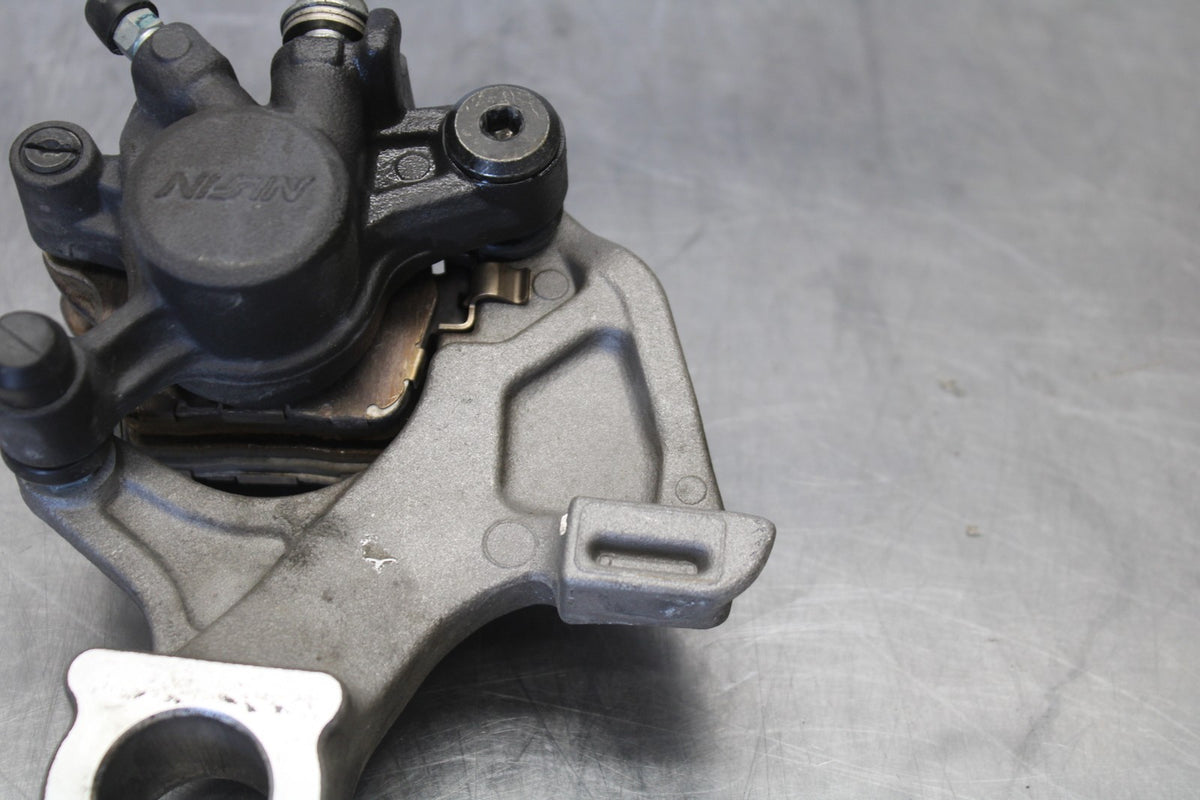 18 SUZUKI GSXR750 REAR BACK BRAKE CALIPER W MOUNT BRACKET BB891