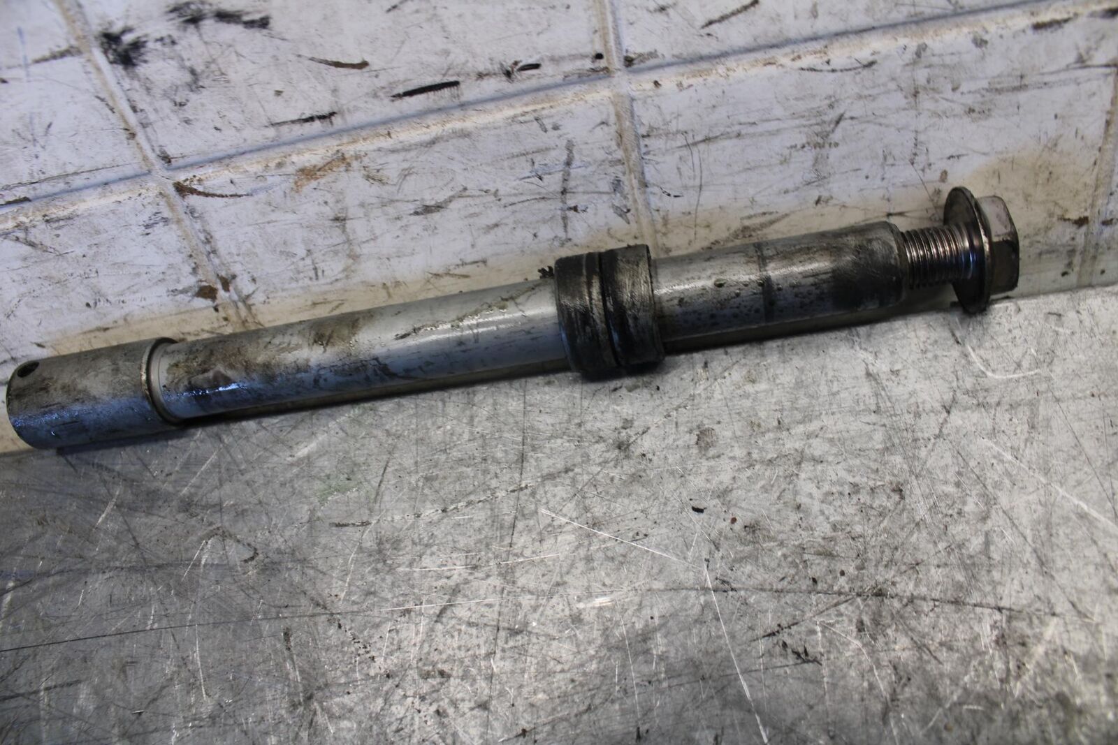 2007 Honda CBR600RR FRONT WHEEL RIM AXLE PIVOT BOLT 44301-MFJ-D00 BB536