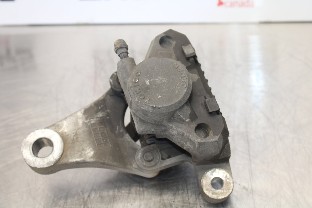 00 SUZUKI SV650 REAR BACK BRAKE CALIPER W MOUNT BRACKET BB156
