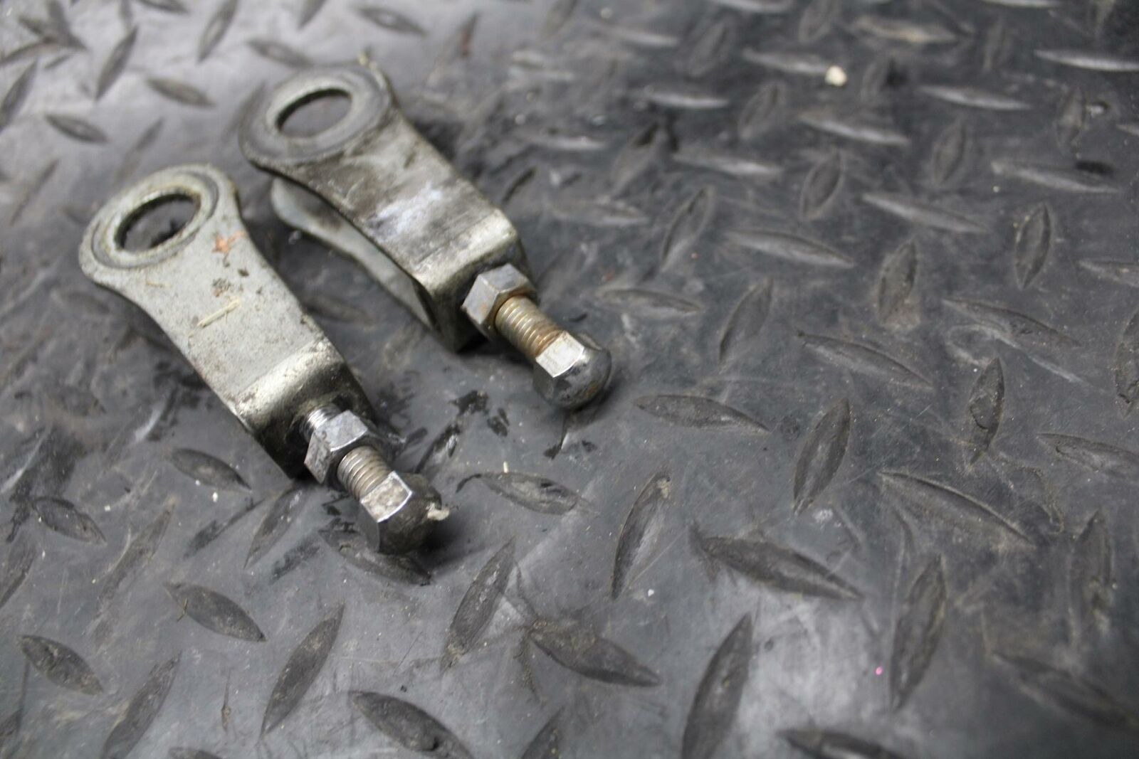 86 SUZUKI GS750ES SWINGARM CHAIN TENSIONER ADJUSTMENT BRACKETS  BB233