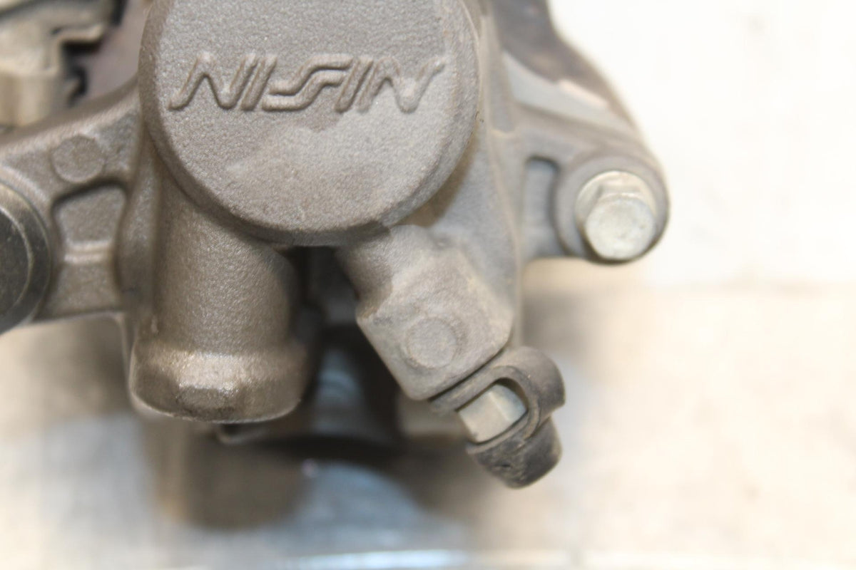2007 Honda CBR600RR REAR BRAKE CALIPER W MOUNT BRACKET 43150-MFJ-D01 BB596