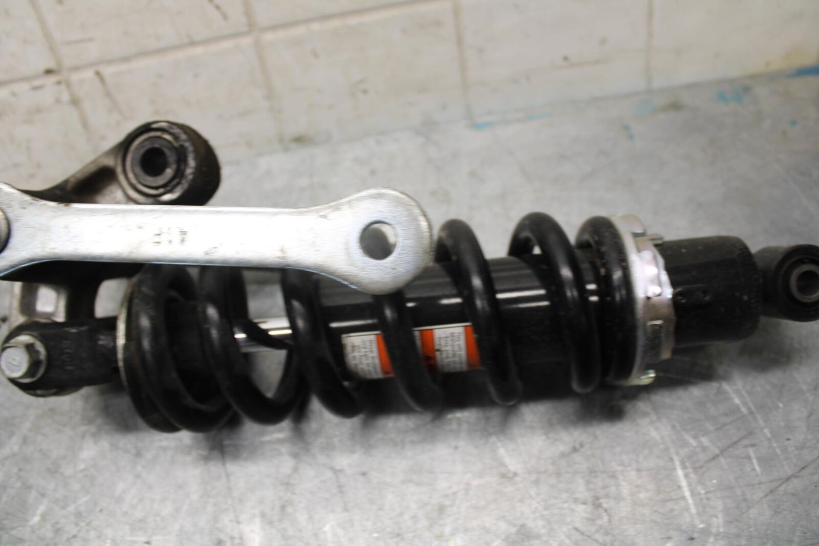 2007 Suzuki Boulevard M50B REAR BACK SHOCK ABSORBER LINK 62100-41F10 BB537