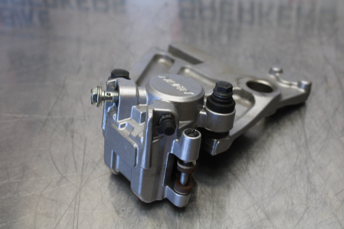 07 KAWASAKI Z1000 REAR BACK BRAKE CALIPER W MOUNT BRACKET BB148