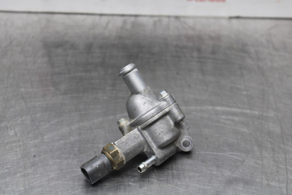 08 HONDA CBR125R THERMOSTAT W HOUSING ASSEMBLY BB804