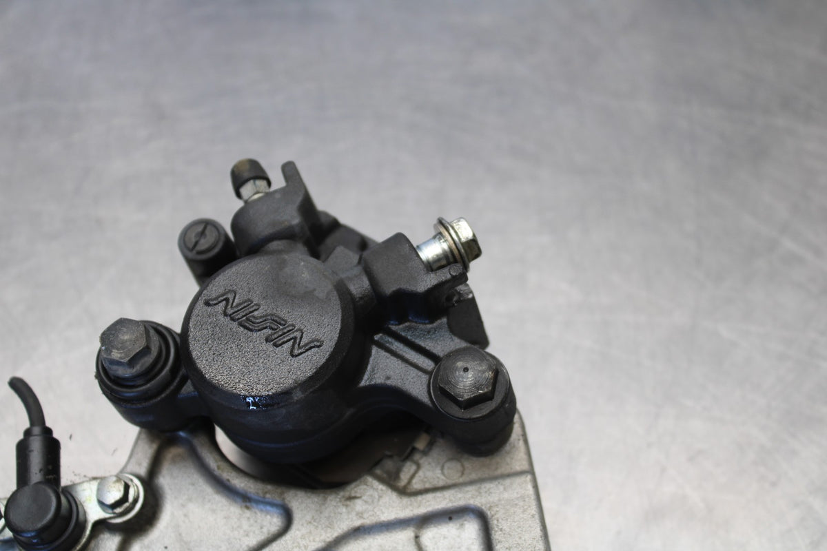 10 SUZUKI SV650 REAR BACK BRAKE CALIPER W MOUNT BRACKET BB181