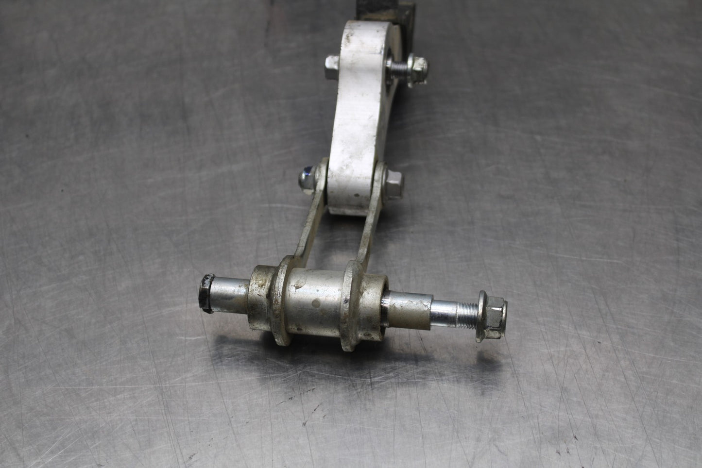22-25 YAMAHA YZF R7 REAR DOGBONE SHOCK LINKAGE LINK 1WS-2217A-00-00 BB769