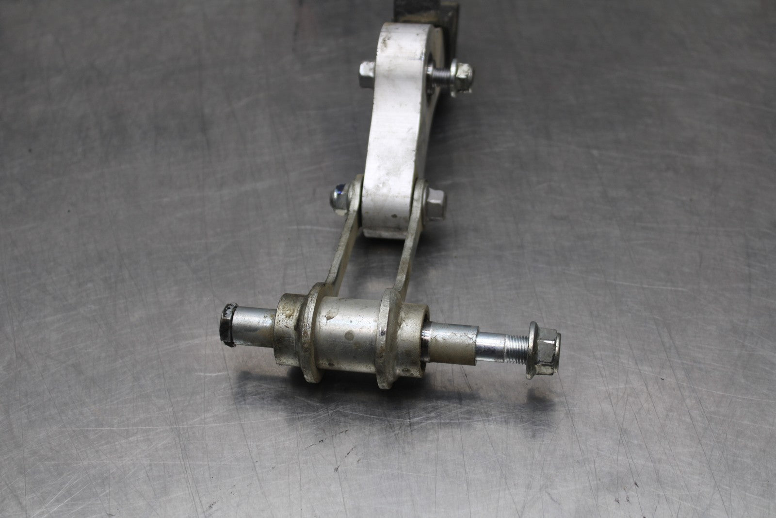 22-25 YAMAHA YZF R7 REAR DOGBONE SHOCK LINKAGE LINK 1WS-2217A-00-00 BB769