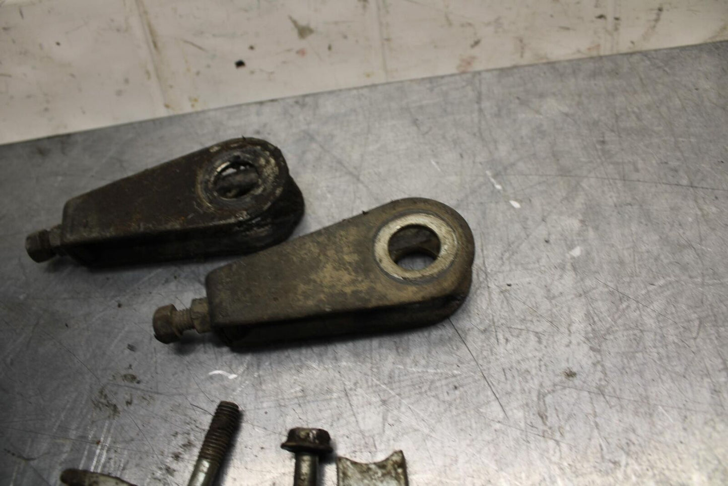 75 SUZUKI GT 550 SWINGARM CHAIN TENSIONER ADJUSTMENT BRACKETS  BB72