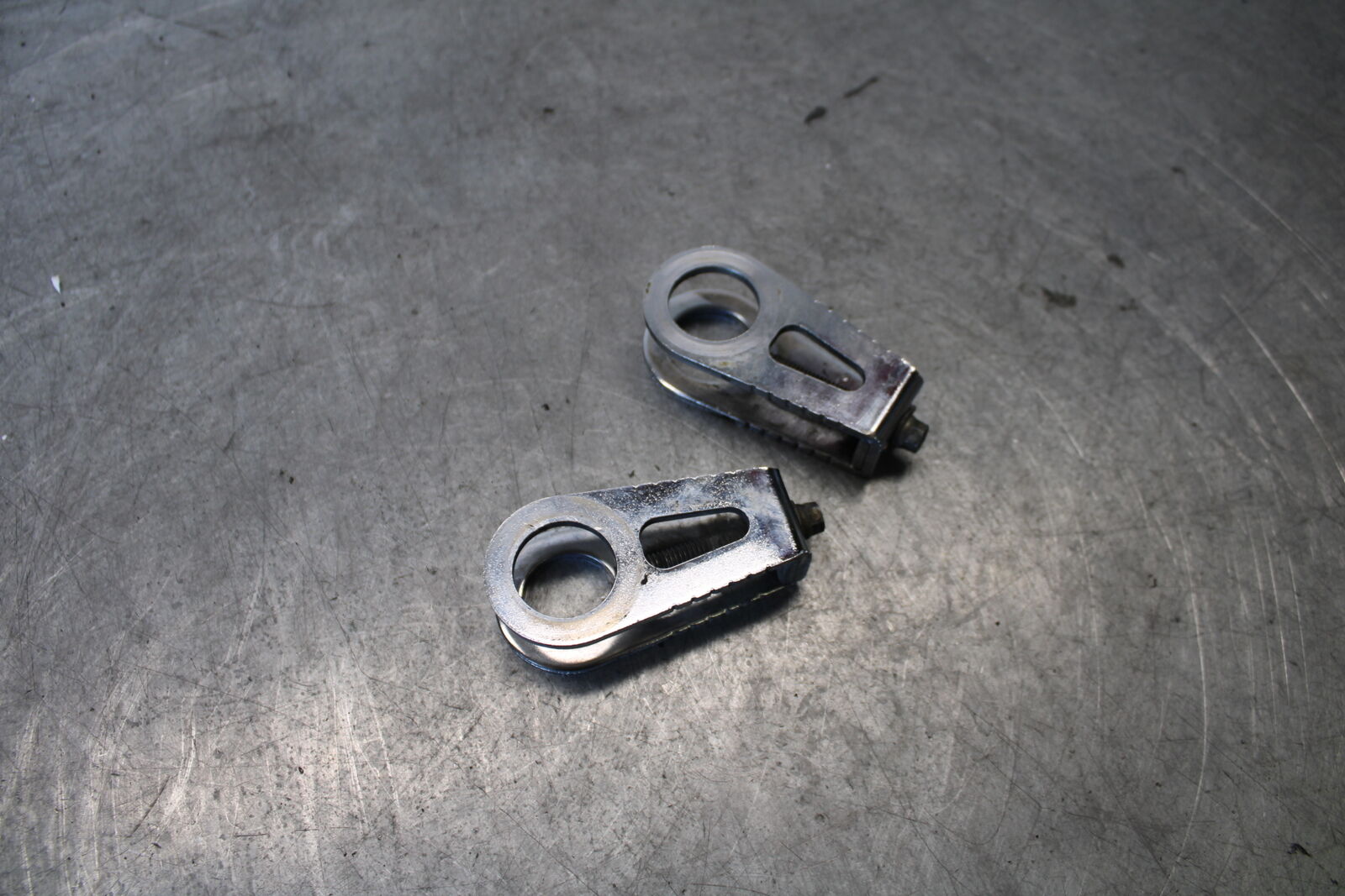 03-04 HONDA CBR600RR SWINGARM CHAIN TENSIONER ADJUSTMENT BRACKETS BB661
