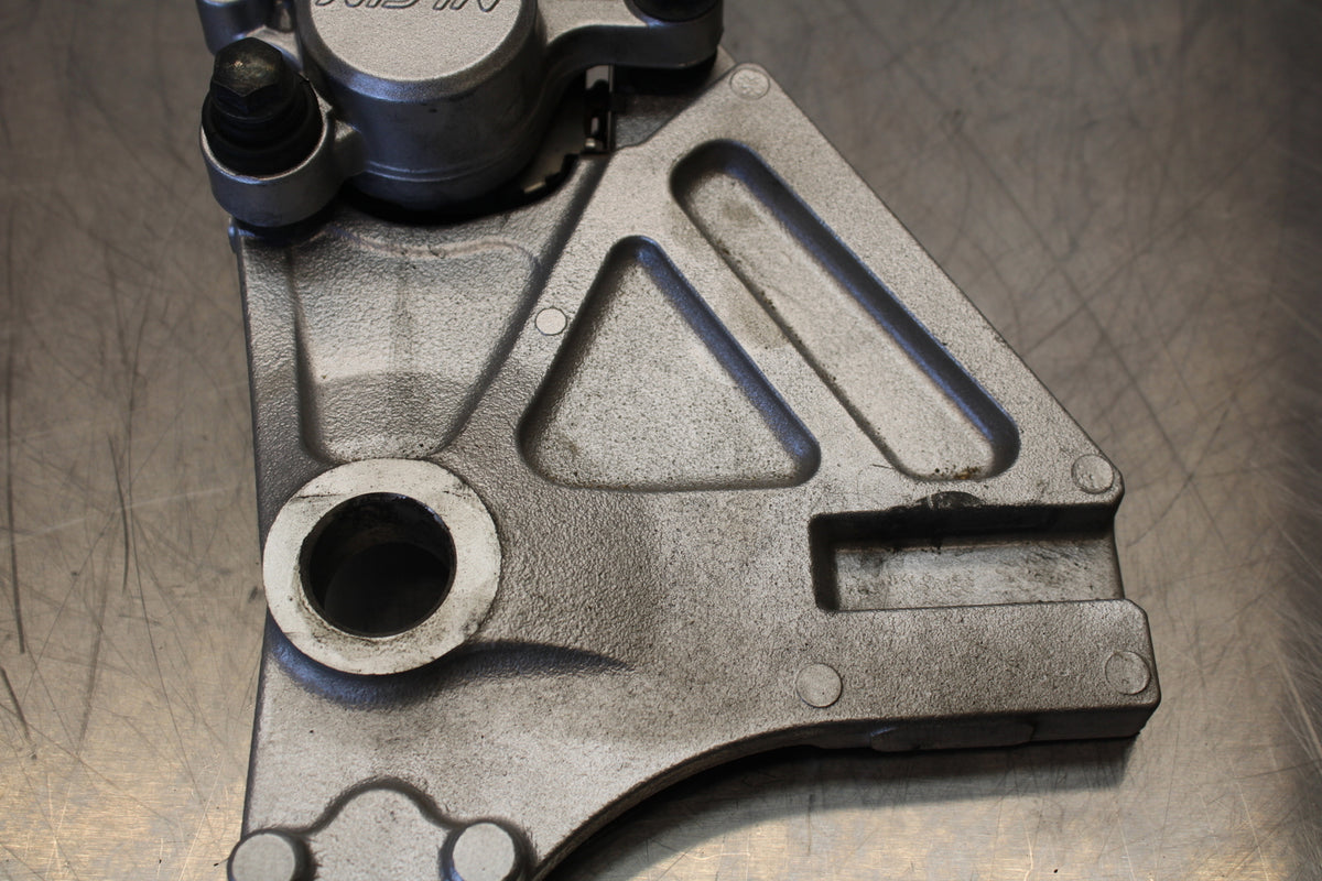 07 KAWASAKI Z1000 REAR BACK BRAKE CALIPER W MOUNT BRACKET BB148