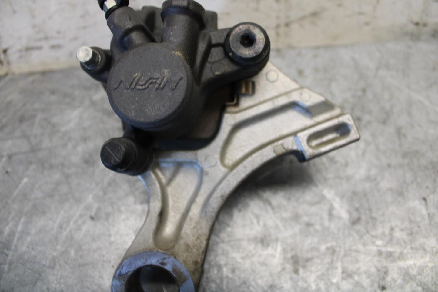 2009 Honda CBR600RR REAR BACK BRAKE CALIPER W MOUNT BRACKET 43150-MFJ-A51 BB536