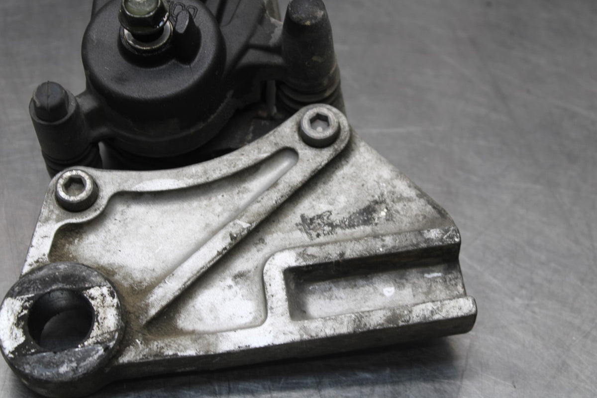 06 KAWASAKI Z750 REAR BACK BRAKE CALIPER W MOUNT BRACKET BB837