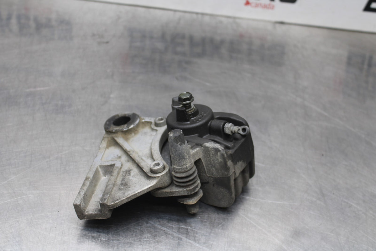 06 KAWASAKI Z750 REAR BACK BRAKE CALIPER W MOUNT BRACKET BB837