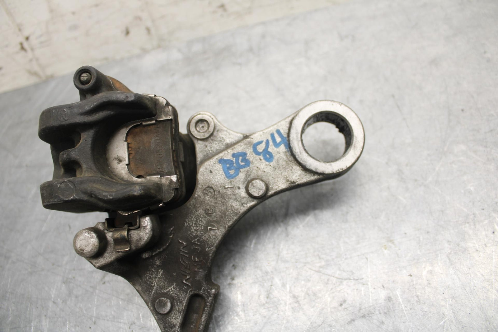 2007 Honda CBR600RR REAR BACK BRAKE CALIPER W MOUNT BRACKET 43150-MFJ-D01 BB42