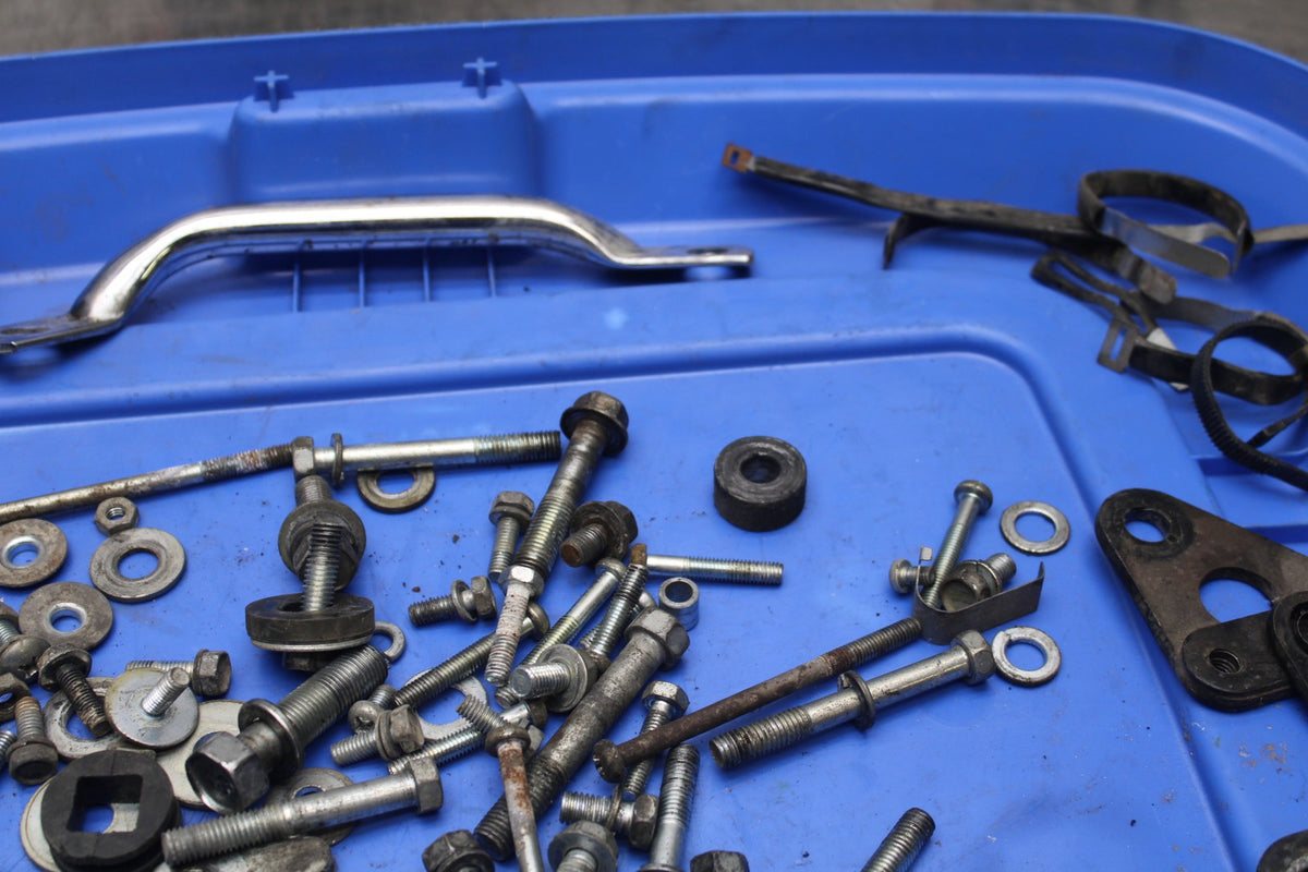 77 SUZUKI GS750 LEFTOVER MOUNTING BOLTS HARDWARE MOTOR SCREWS BB779