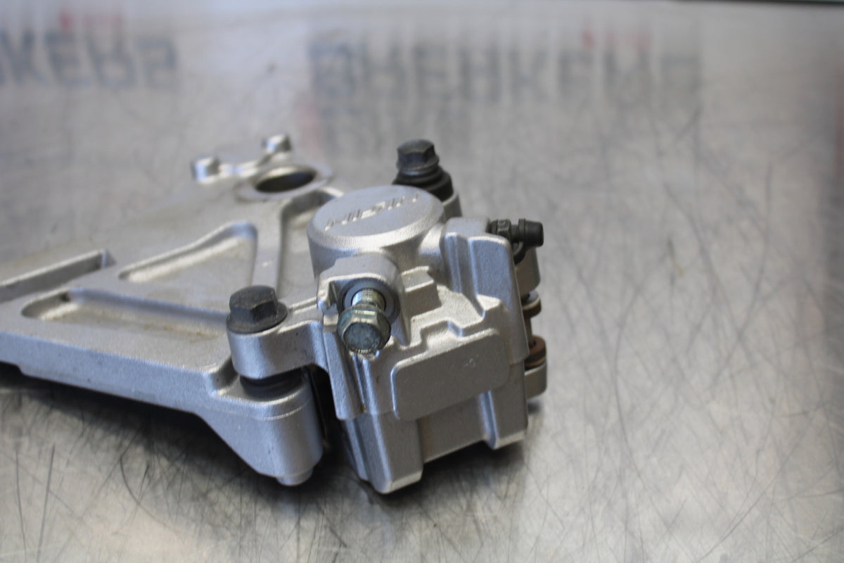 07 KAWASAKI Z1000 REAR BACK BRAKE CALIPER W MOUNT BRACKET BB148