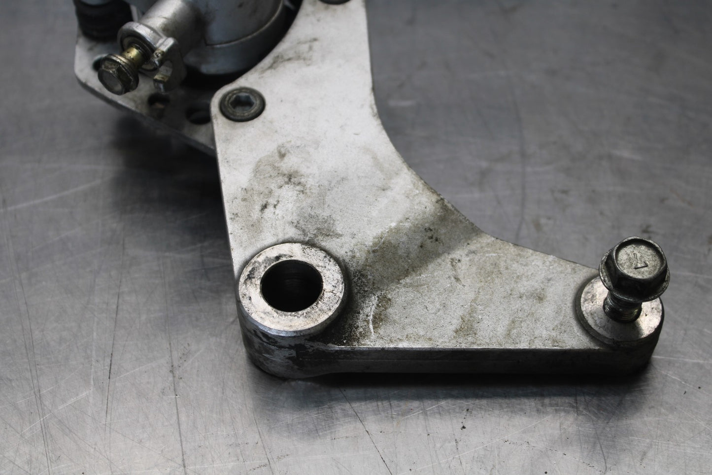 03-08 KAWASAKI VULCAN 1600 REAR BACK BRAKE CALIPER W MOUNT BRACKET BB196