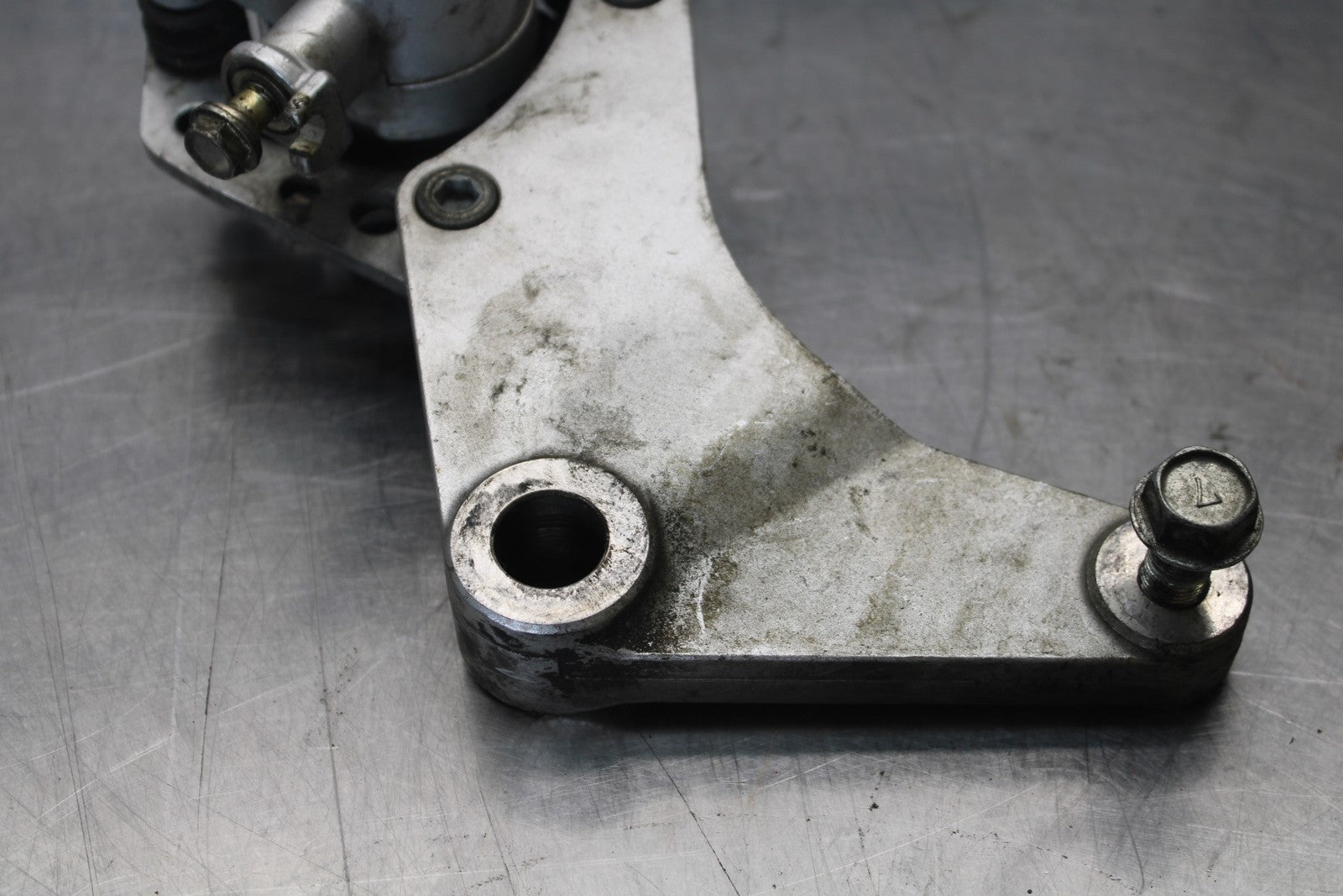 03-08 KAWASAKI VULCAN 1600 REAR BACK BRAKE CALIPER W MOUNT BRACKET BB196