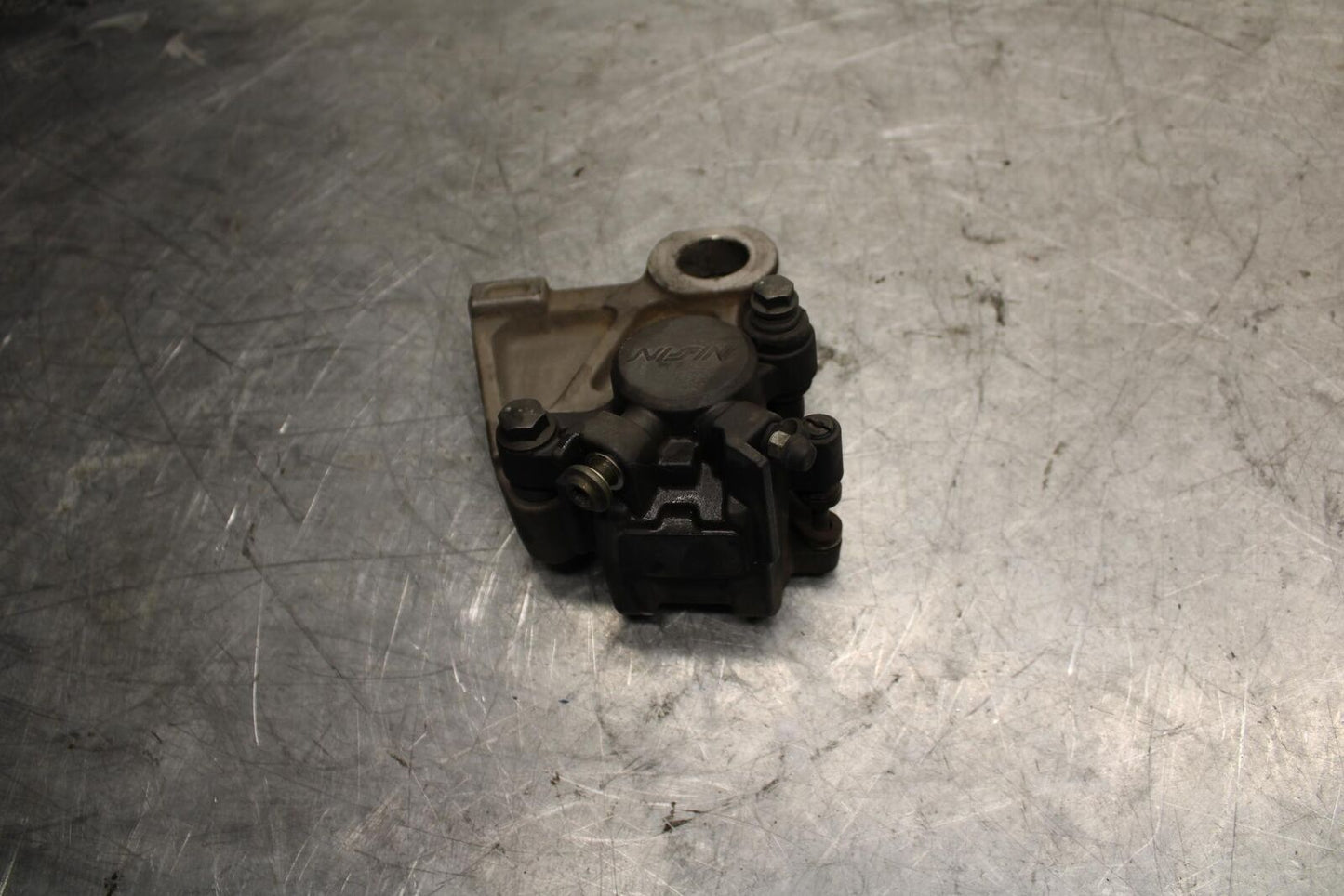 2007 Yamaha YZF R6 REAR BACK BRAKE CALIPER W MOUNT BRACKET BB525
