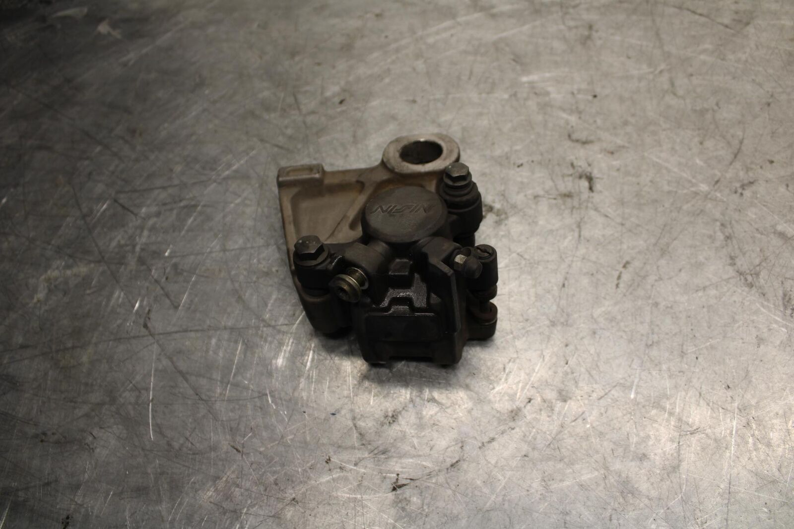 2007 Yamaha YZF R6 REAR BACK BRAKE CALIPER W MOUNT BRACKET BB525
