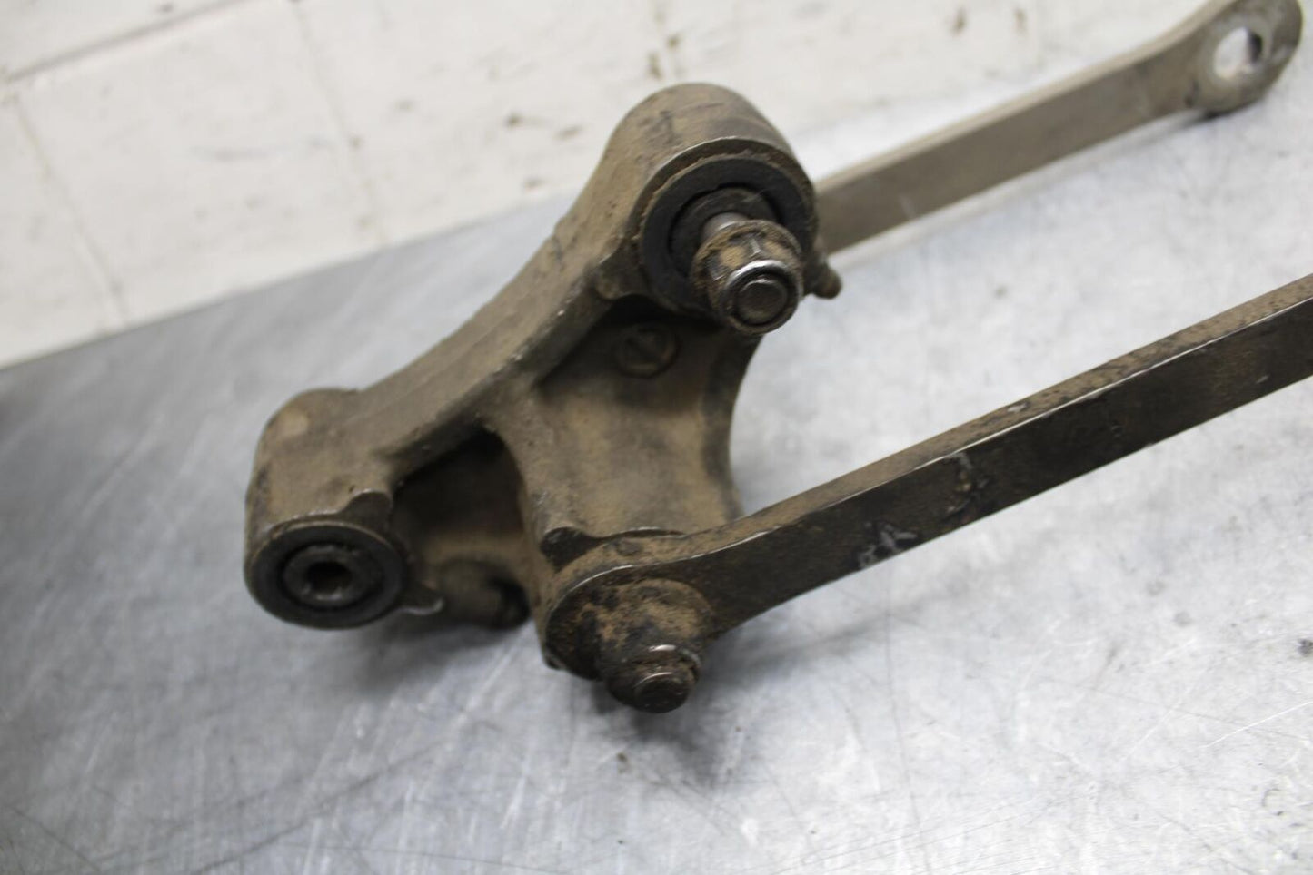 2004 Kawasaki Ninja ZX6RR ZX600M REAR DOGBONE SHOCK LINKAGE LINK BB43